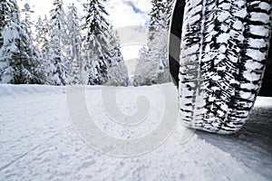 Winter tyres on snow covered road