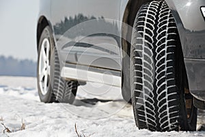 Winter tyres wheels installed on suv car outdoors