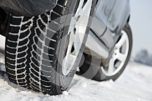 Winter tyres wheels installed on suv car outdoors