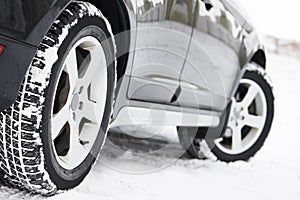 Winter tyres wheels installed on suv car outdoors