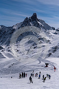 Winter vacation at the Courchevel ski resort on a beautiful sunny day.