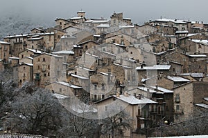 Winter view of authentic medieval villages of Abruzzo - Scanno with snow, Italy photo