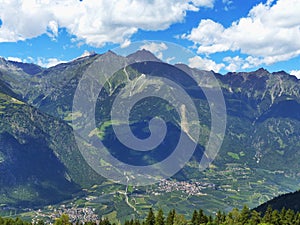 Winter view of the beautiful valley of Vinschgau Southern Tyrol. Snow at tops of mountains. In the valley of the village and locks