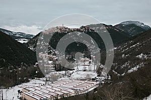 Winter view of Borgo Cerreto mountain village covered by snow in Valnerina, Umbria