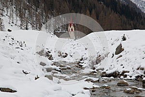 Winter view of the church of Santo Spirito near Casere in South Tyrol at the end of the Valle Aurina