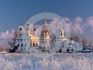 Winter view of the ensemble of ancient orthodox churches in Dymkovo Sloboda, Veliky Ustyug, Vologodsky region, Russia photo