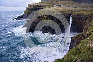 Winter view of Faeroe Islands waterfall photo