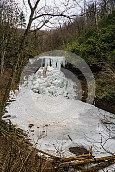 A Winter View of the Frozen Cascade Falls