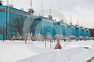 Winter view on gas compressor station in Ukraine. The equipment at gas field