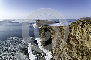 Winter view of high cliff of Tobizin cape, Primorye, Russia