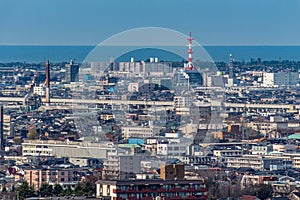 Winter view of Kanazawa, with shinkansen line, from Daijouji Hill Park, looking west towards the Japan Sea. Ishikawa