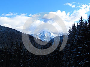 Winter view of mountains Å pik in Julian alps