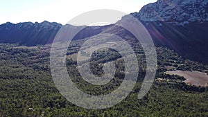 Winter view of Pic Saint Loup, north face, Herault, Occitanie, Chateau de Vivioures