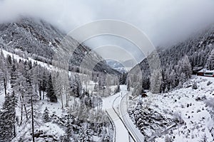 Winter view of Switzerland on the train photo