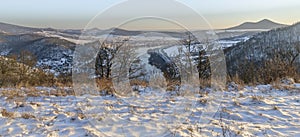 Winter view for valley of river Labe in frosty snowy landscape