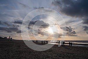 Winter walking on wide sandy beach of North sea near Zandvoort in Netherlands