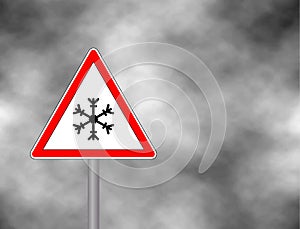 Winter warning sign shows danger of ice and snow at street, highway or road. Snow warning sign Risk of Ice warning sign isolated