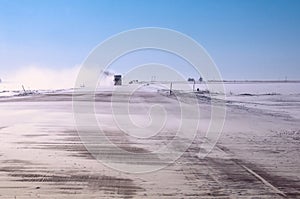 Winter wind and blowing snow on a major highway