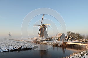 Winter windmill landscape in Holland
