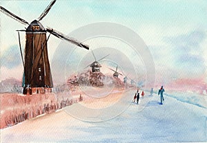 Winter windmills ans skating peopl photo