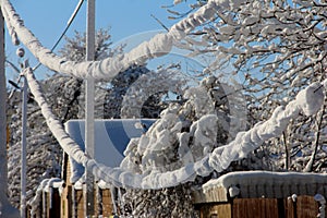 Winter wires. Snow-covered power grids
