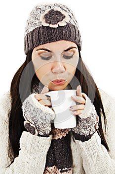 Winter woman drinking tea