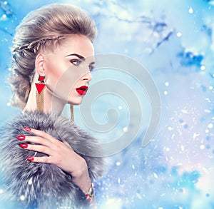 Winter woman in fur coat