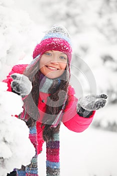 Winter woman play snowballs