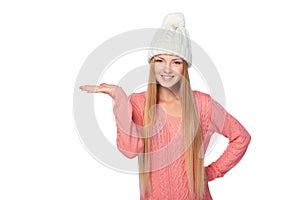 Winter woman showing blank copy space