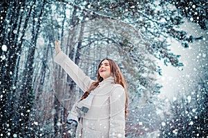 Winter woman snow. Christmas girl outdoor portrait. Winter woman happy.