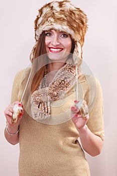 Winter woman in warm clothing fur cap