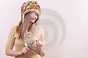 Winter woman in warm clothing fur cap