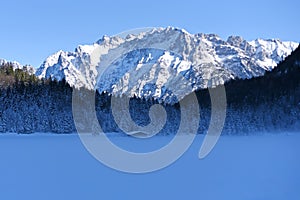 Winter wonderland landscape on the lake Ferchensee in Bavaria, Germany photo