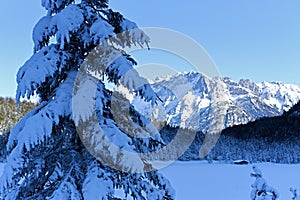 Winter wonderland landscape by the lake Ferchensee in Bavaria, Germany photo