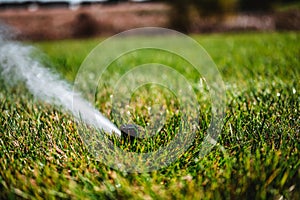 winterizing a irrigation sprinkler system by blowing pressurized air through to clear out water