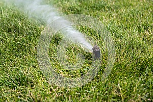 winterizing a irrigation sprinkler system by blowing pressurized air through to clear out water