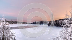Winterly landscape with abandoned cable car pillars in Swedish Lapland