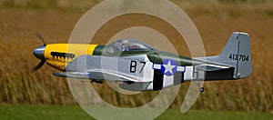 Winterton, Scunthorpe, UK. July 2022.0 Model radio controlled Mustang P51 in flight.