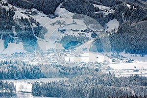 Wintery village in alpine valley, Tyrol, Austria