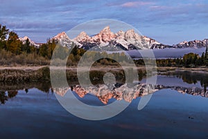 wintry autumn weather on snow capped Mt. Moran in Grand teton national Park in Wyoming