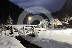 Wintry landscape with chalet. photo