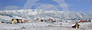 Wintry panorama of Piatra Craiului Mountains photo