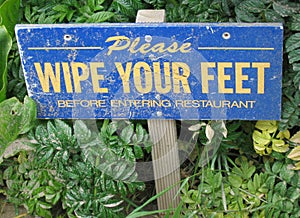 Wipe your feet sign