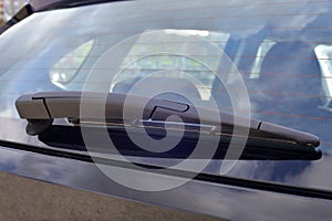 Wiper on the back windshield of a passenger car