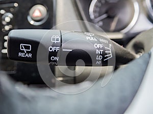 The wiper control in modern car adjust speed to clean the mirror