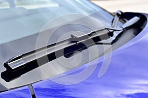 Wiper on the front windshield of a passenger car