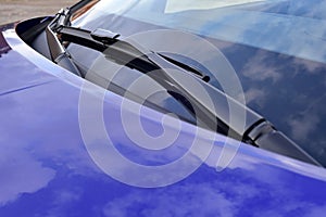 Wiper on the front windshield of a passenger car