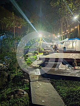 WIRA GARDEN, BANDAR LAMPUNG, INDONESIA-JULY 18, 2022: beautiful natural attractions at night beside the river