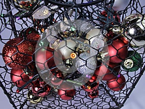 wire basket decoration.. Christmas lights, balls, sparkle