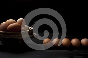 Wire basket with fresh eggs